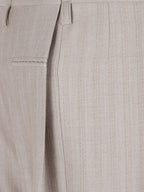 PLEATED TROUSERS