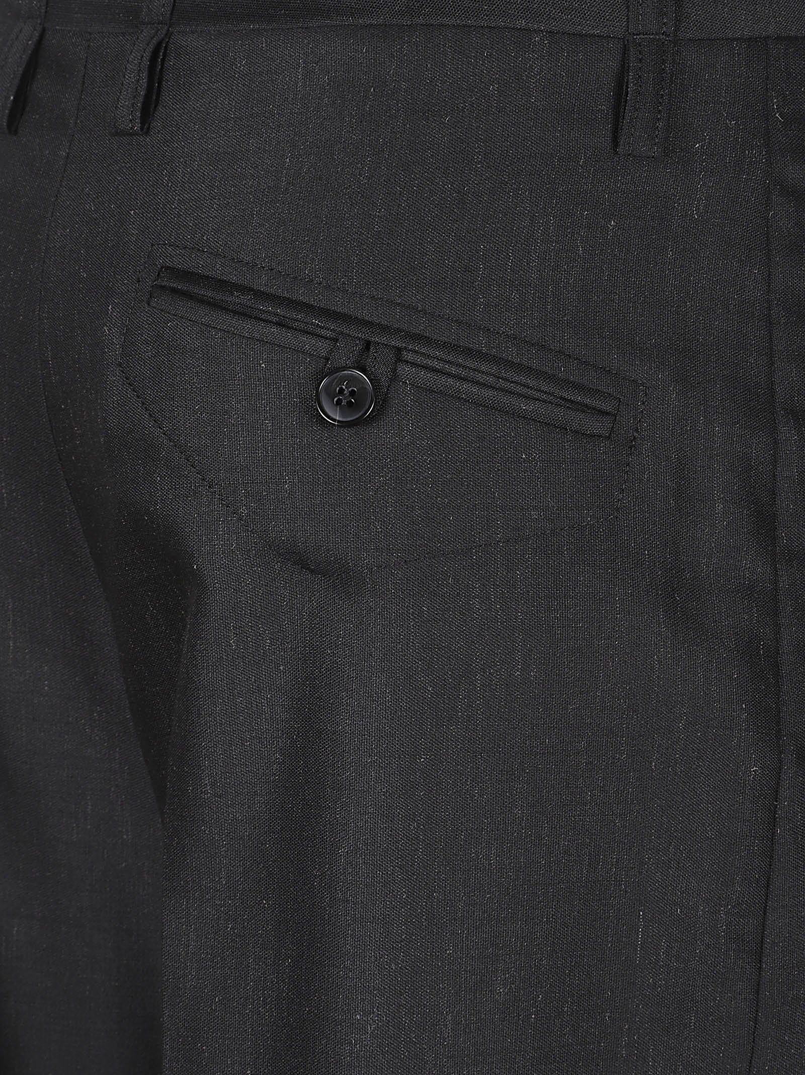 CURVED LEG TROUSERS
